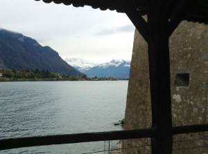 View of Lake Geneva and the Swiss Alps from window inside the Chateau de Chillon