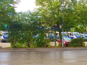 Police cars parked outside the train station in Freilassing, Germany, as they manage the influx of refugees/immigrants who want to enter Germany