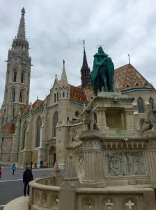 Matthias Church in Budapest on Castle Hill with King Saint Stephen's sculpture in the foreground