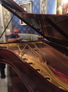 Tuning the Steinway inside the museum of La Scala opera house, the very piano of Franz Listz