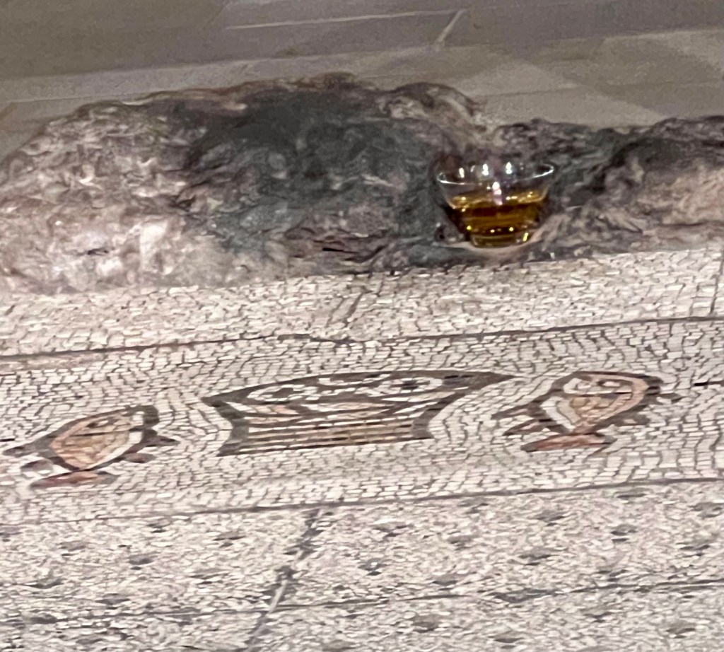 Feeding the 5,000 men with the loaves and fishes